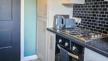 Refrigerador, horno, placa de cocina, tostadora