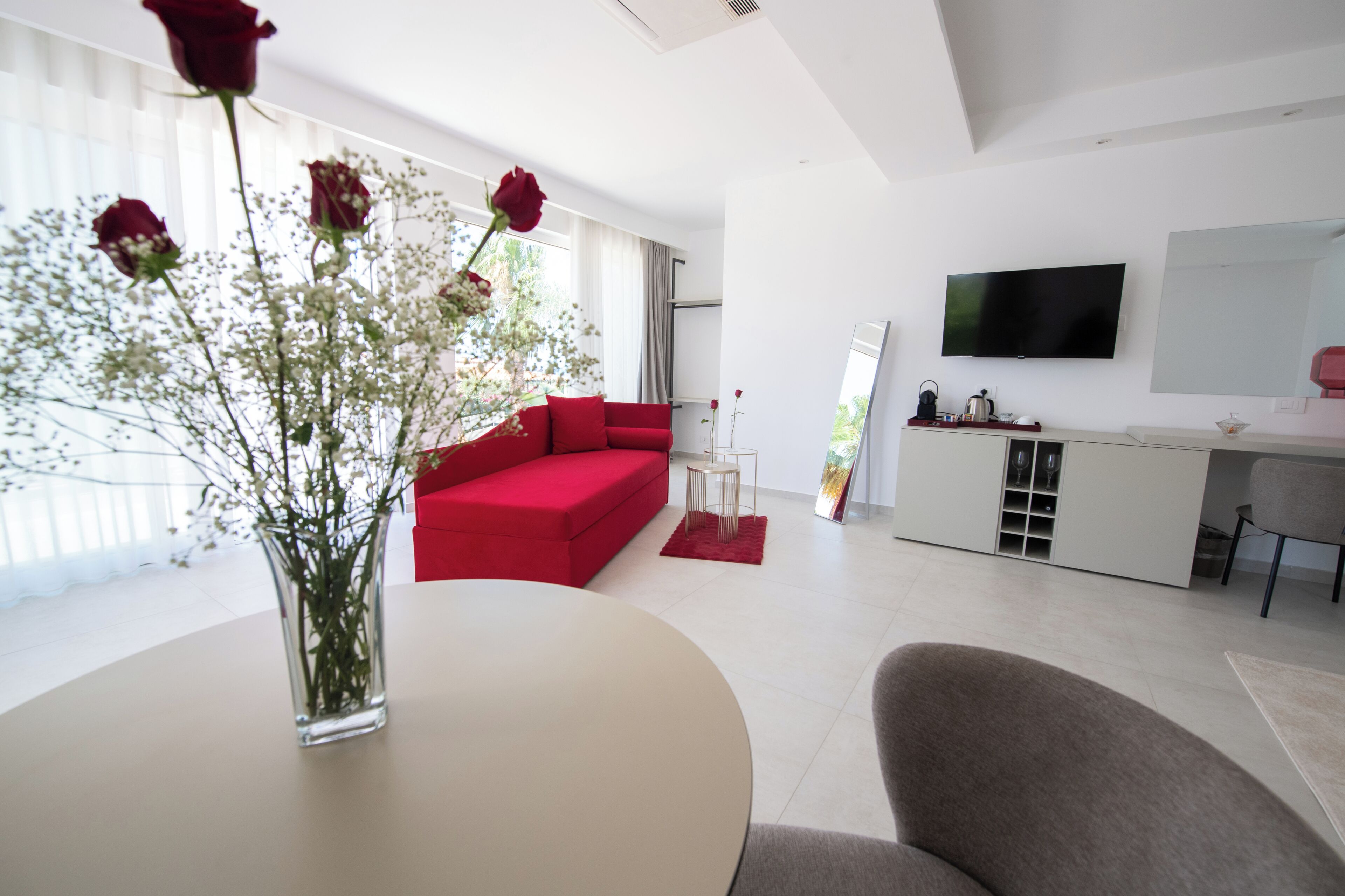 Quadrupla Deluxe, balcone, vista mare | Area soggiorno