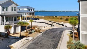 Exterior - Water Views + Pool Access | Driftwood Cottage (Navarre Beach)