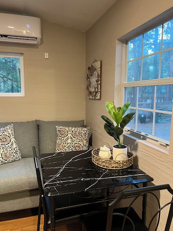 Living area. Cozy 1-bedroom cabin in lovely Bastrop- stay a weekend or longer