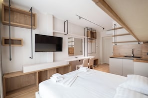 Studio Suite Deluks | Setrika/meja setrika, Wi-Fi gratis, dan seprai linen