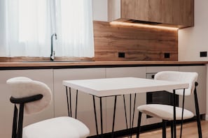 Deluxe-Apartment, 1 Schlafzimmer | Speisen