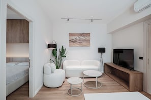 Deluxe-Apartment, 1 Schlafzimmer | Wohnbereich