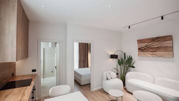 Deluxe Apartment, 1 Bedroom | Iron/ironing board, free WiFi