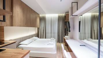 Studio Suite Deluks | Setrika/meja setrika, Wi-Fi gratis, dan seprai linen