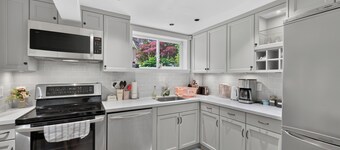 Tranquil Garden Level Retreat near UBC