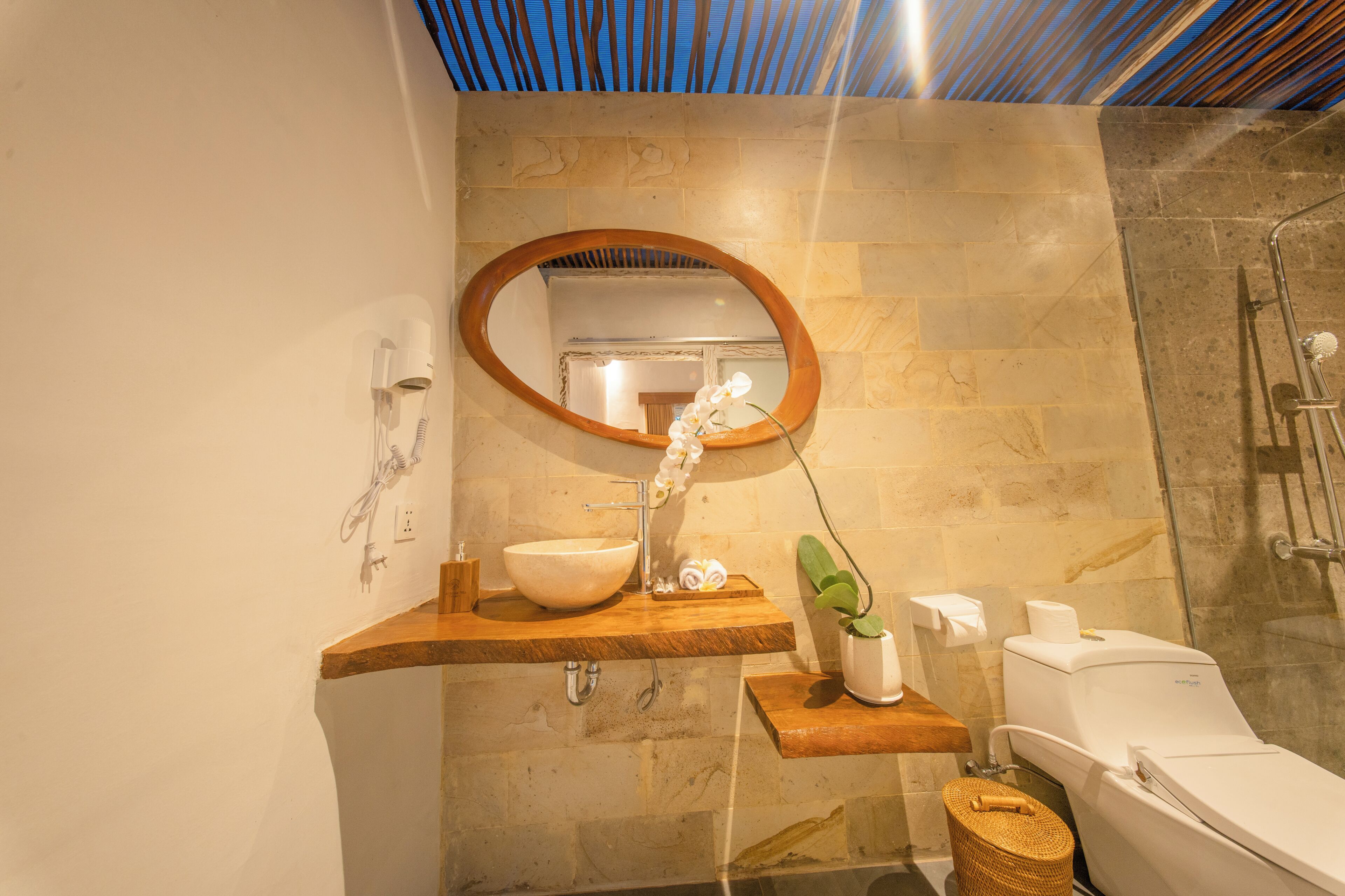 Separate bathtub and shower, hair dryer, towels, soap
