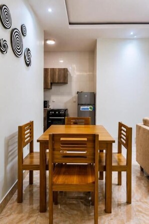 Double Room, Balcony, City View | Dining - KIGALI SAVANNAH HOMES AND E6 APARTMENT (Kigali)