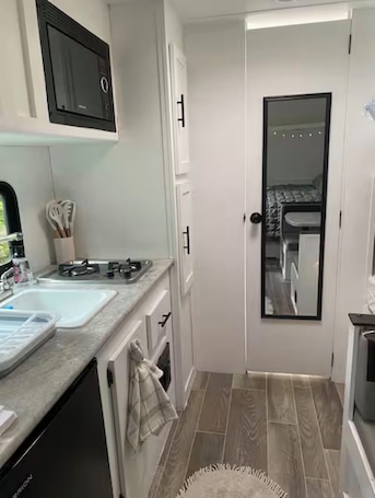 Private kitchen. Charming RV in friendly Bethpage