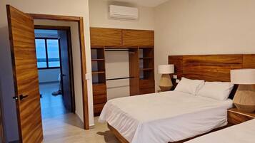 Deluxe Suite, Balcony, Sea View | In-room safe, iron/ironing board (on request), rollaway beds (free)