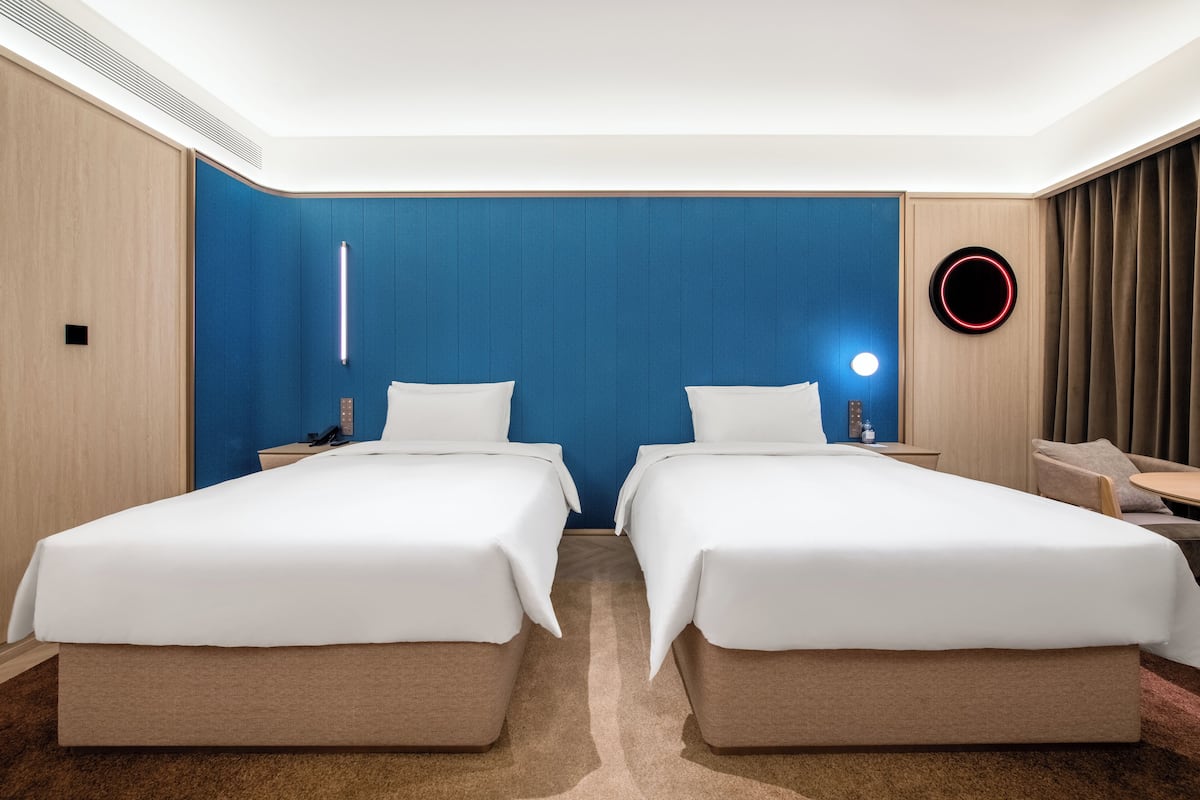 Comfort Twin Room | Down comforters, free minibar, desk, blackout drapes