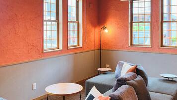 Deluxe House, Non Smoking (Include projector) | Living area | 65-inch flat-screen TV with digital channels