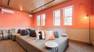 Deluxe House, Non Smoking (Include projector) | Living area | 65-inch flat-screen TV with digital channels