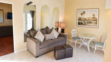 Superior Suite, 1 Bedroom, Kitchen, Pool View | Living area