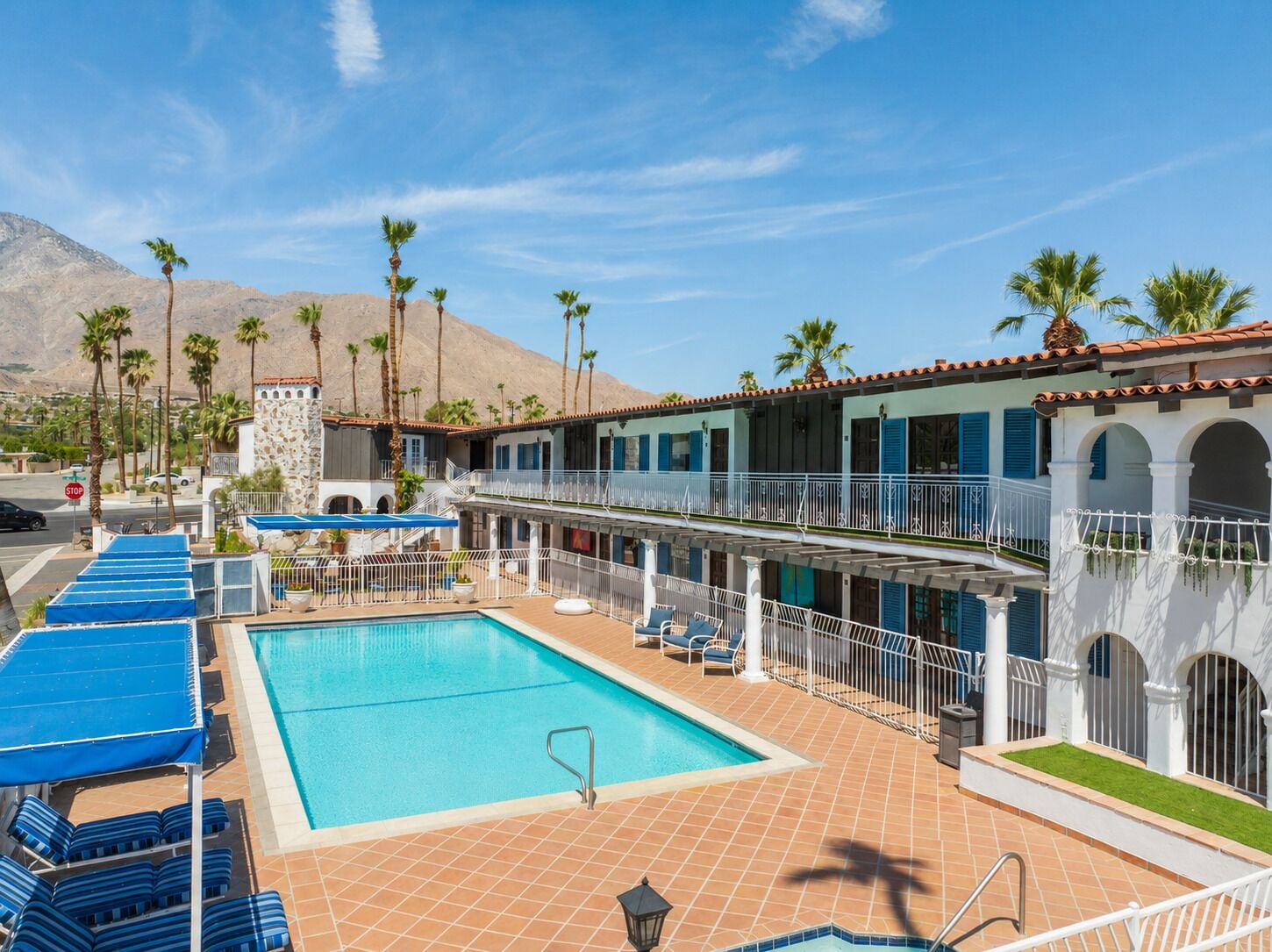Outdoor pool, open 8:00 AM to 11:00 PM, pool umbrellas, pool loungers