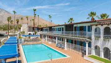Outdoor pool, open 8:00 AM to 11:00 PM, pool umbrellas, pool loungers