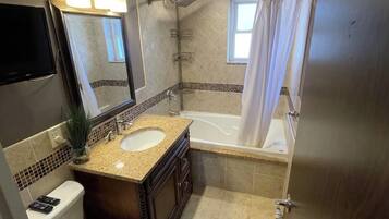 Hair dryer, towels, soap, toilet paper