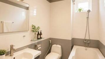 Deluxe Double Room Single Use | Bathroom | Shower, hair dryer, towels, soap