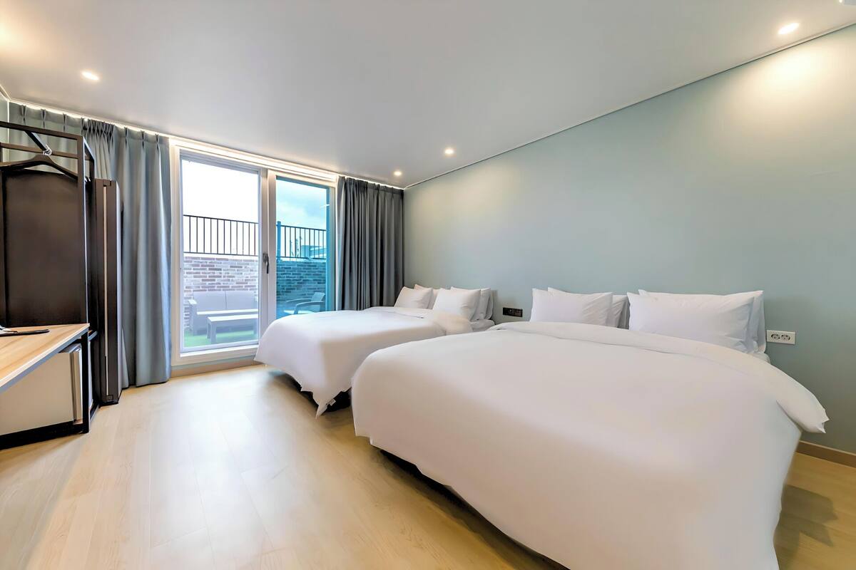Family Twin Room, Terrace | Blackout curtains, soundproofing, free WiFi, bed sheets