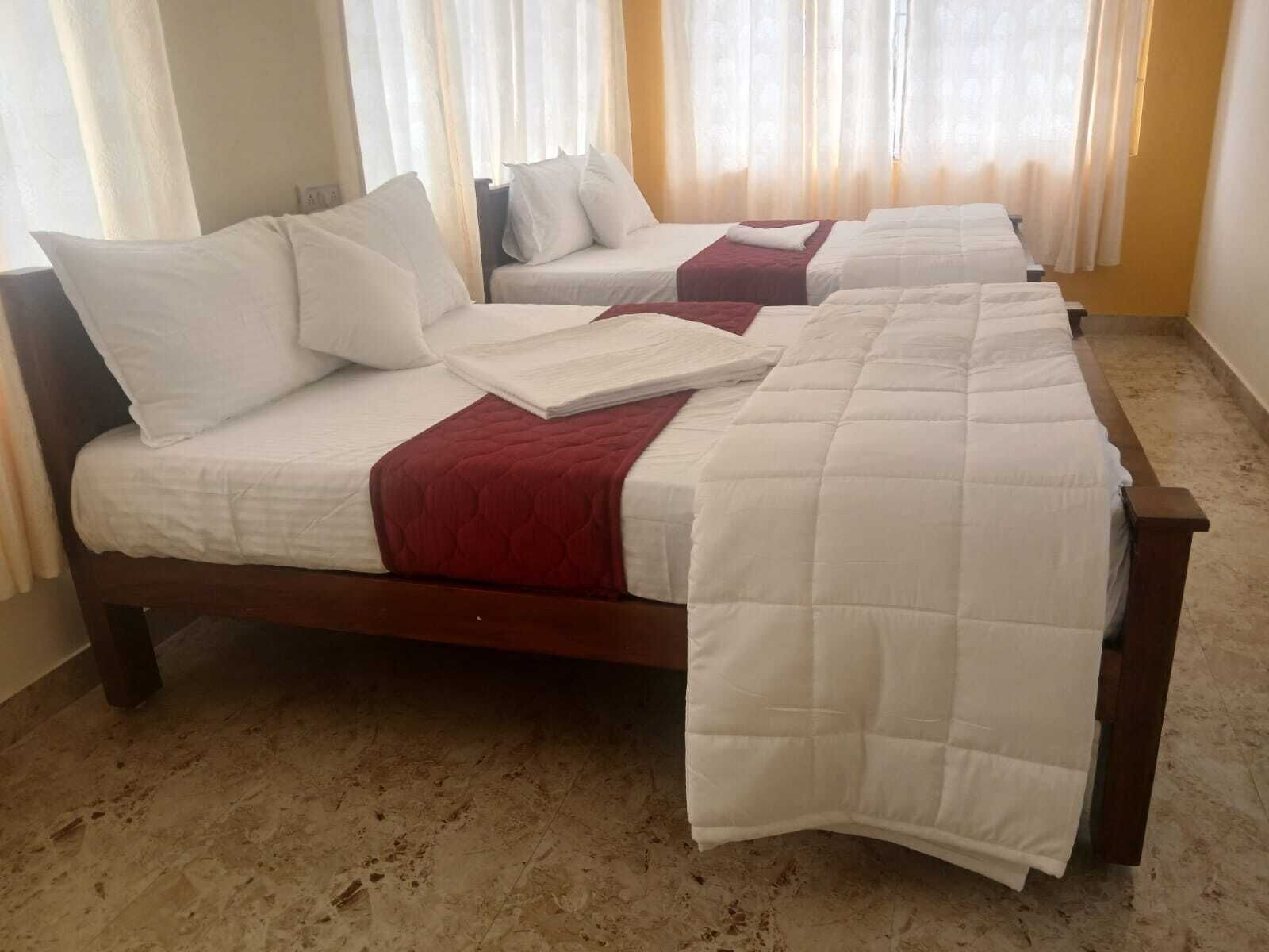 Apartamento família | Escrivaninha, espaço de trabalho para notebook