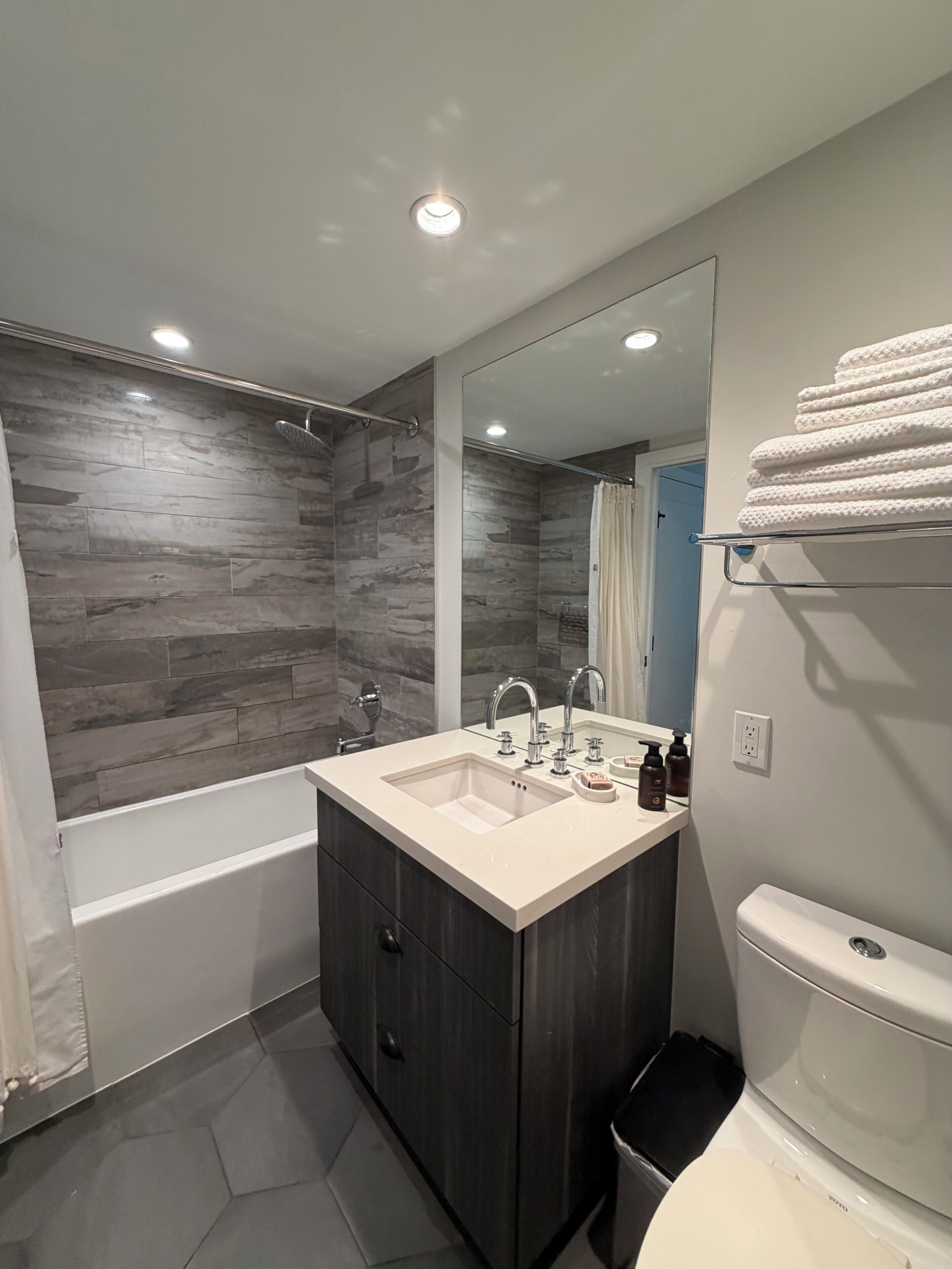 Hair dryer, towels, soap, toilet paper