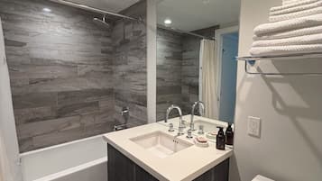 Hair dryer, towels, soap, toilet paper