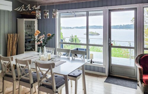 Beautiful home in Stathelle with house sea view