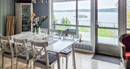 Beautiful home in Stathelle with house sea view