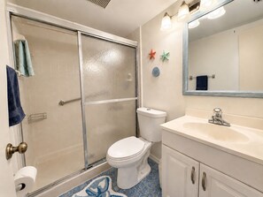 Shower, towels, soap, toilet paper