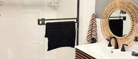 Shower, hair dryer, towels, soap