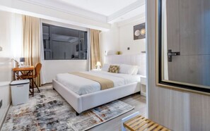 Apartemen Deluks, balkon, pemandangan kota | Wi-Fi gratis