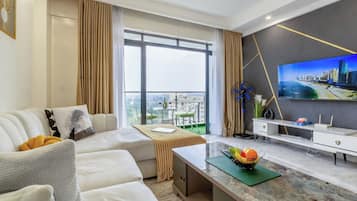 Deluxe Apartment, Balcony, City View | Living area