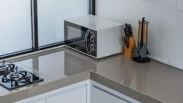 Townhome, Balcony, Courtyard View | Private kitchen | Fridge, microwave, oven, stovetop