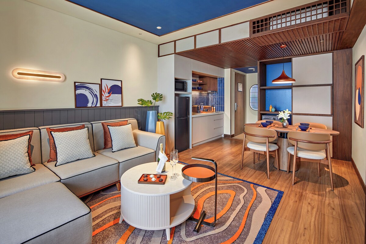 Minibar với thức uống miễn phí, két bảo mật tại phòng, bàn 