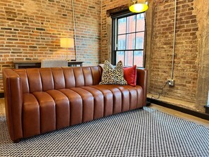 Living area - Brick & Bed - Beautiful Historic Riverfront Loft (St. Louis)