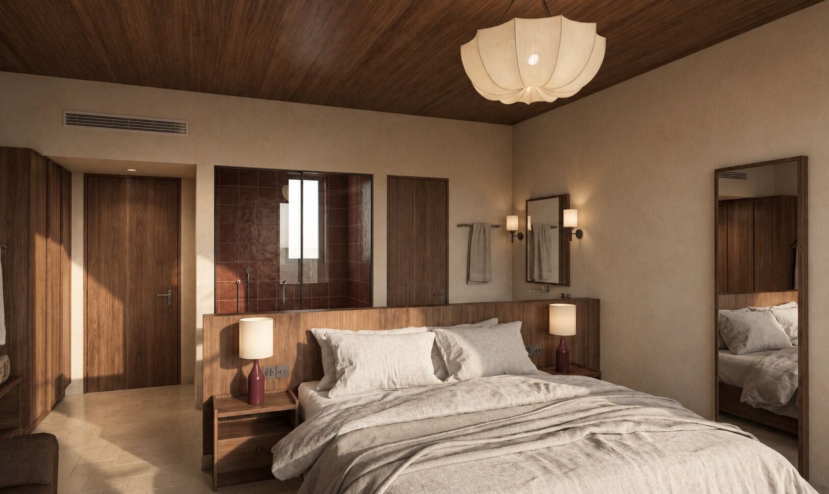 Ein Schlafzimmer mit Holzboden, einem großen Bett mit weißer Bettwäsche, zwei Nachttischen mit Lampen und einem Spiegel an der Wand.