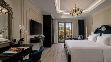 Luxury Suite, Terrace, City View | Minibar, desk, laptop workspace, blackout curtains