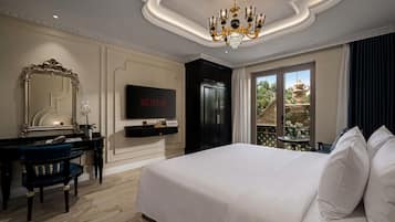 Luxury Suite, Terrace, City View | Minibar, desk, laptop workspace, blackout drapes