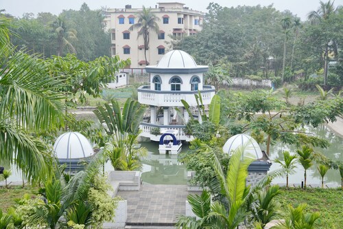 Salam Palace near Goala bazar holiday apartments in a village open swimming pond