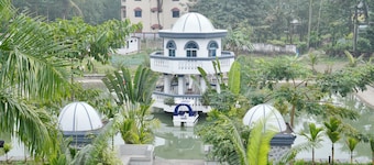 Salam Palace near Goala bazar holiday apartments in a village open swimming pond