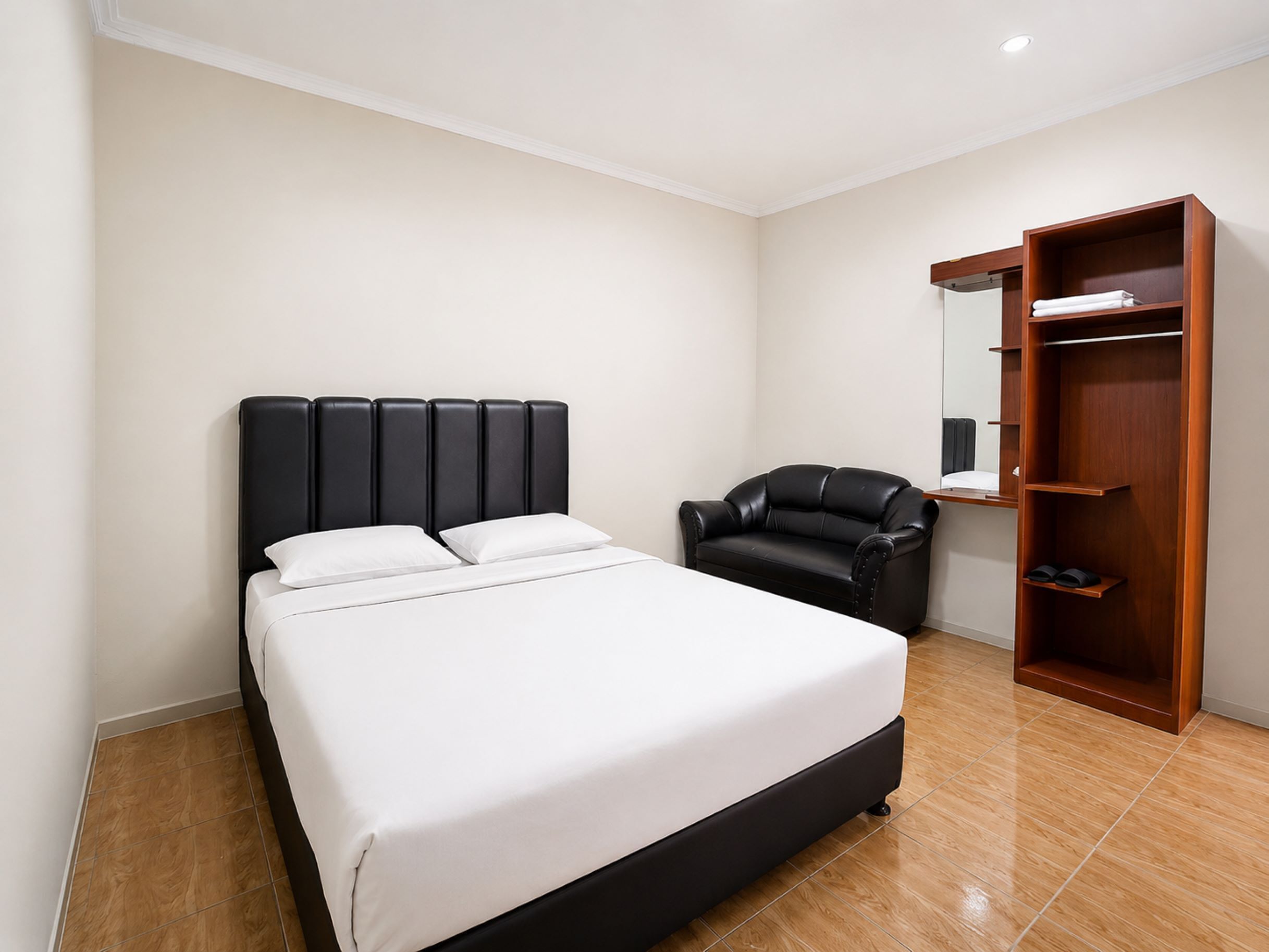 Standard Double Room | Blackout drapes, iron/ironing board (on request), bed sheets