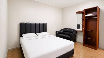 Standard Double Room | Blackout drapes, iron/ironing board (on request), bed sheets