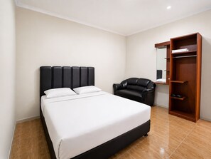 Standard Double Room | Blackout drapes, iron/ironing board (on request), bed sheets