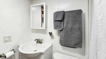 Jetted tub, hair dryer, towels, soap