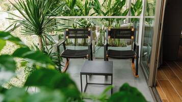 Deluxe Double Room, 1 King Bed, Balcony, City View | Property grounds