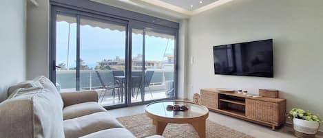 Apartment, Balcony, Sea View | Living area