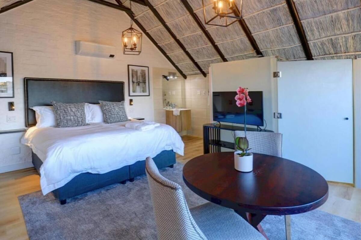 Superior Suite, Lagoon View | In-room safe, iron/ironing board, free WiFi