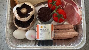 A meal tray with bread, tomatoes, meat, mushrooms, eggs, and baked beans. - Daisys Meadow Retreat Tent Sleeps 2 With Hot Tub (Ashford)