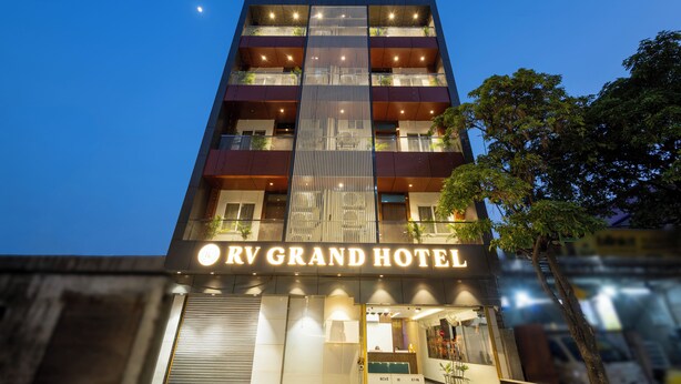 A multi-story hotel with a prominent sign reading 'RV GRAND HOTEL'. - Rv Grand Varanasi (Varanasi)