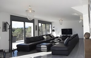 Living area - Holiday Home 'Blau' with Sea Views, Wi-Fi and Air Conditioning (Lloret Blau)